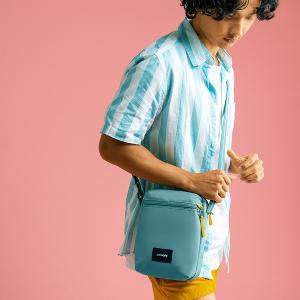 Pacsafe Go 隨行防盜斜背小方包 4.5L-沁心藍