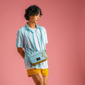 Pacsafe Go隨行防盜斜背方包2.5L-玫瑰粉